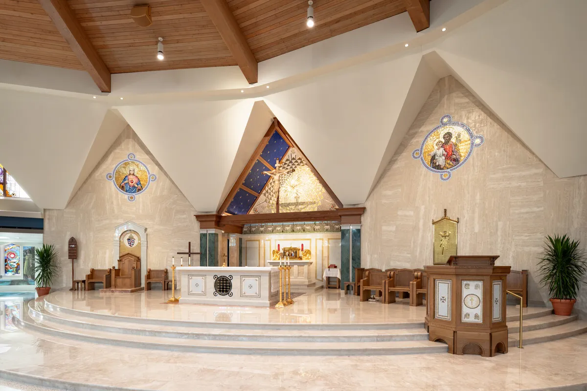 The beautified sanctuary of the Cathedral of St Joseph, its apse covered in gold-ground mosaics